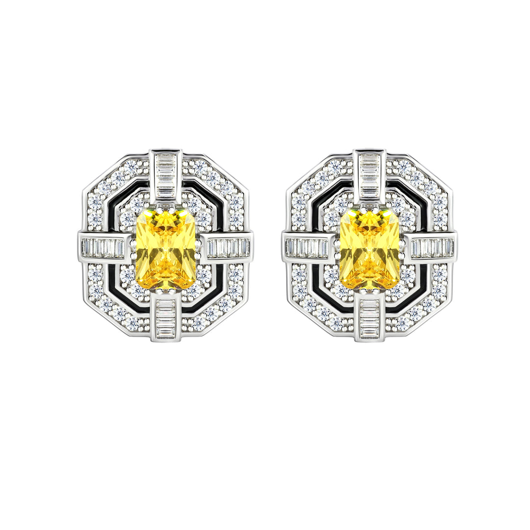 Immerse yourself in the timeless allure of our Art Deco-inspired earrings, where geometric elegance meets opulence. The intricate design, fully adorned with white melee diamonds, frames a central yellow radiant-cut diamond, while an elegant black line, crafted using the Cold Enamel technique, adds a touch of depth, making these earrings a sophisticated and eye-catching accessory.