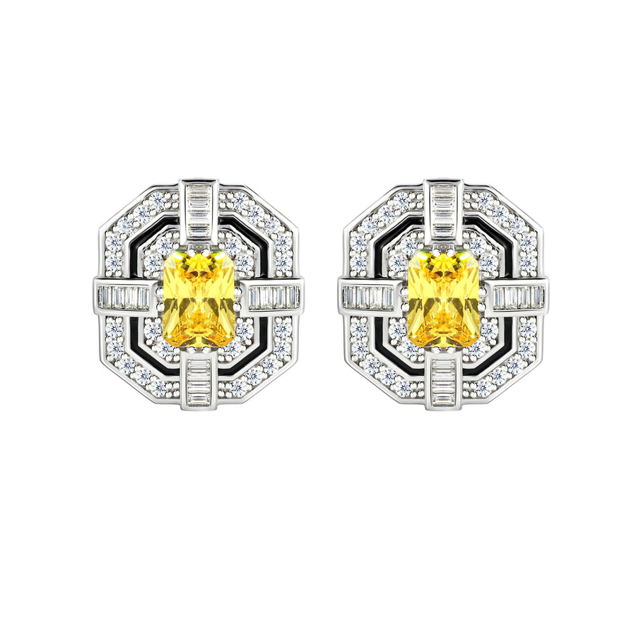Immerse yourself in the timeless allure of our Art Deco-inspired earrings, where geometric elegance meets opulence. The intricate design, fully adorned with white melee diamonds, frames a central yellow radiant-cut diamond, while an elegant black line, crafted using the Cold Enamel technique, adds a touch of depth, making these earrings a sophisticated and eye-catching accessory.
