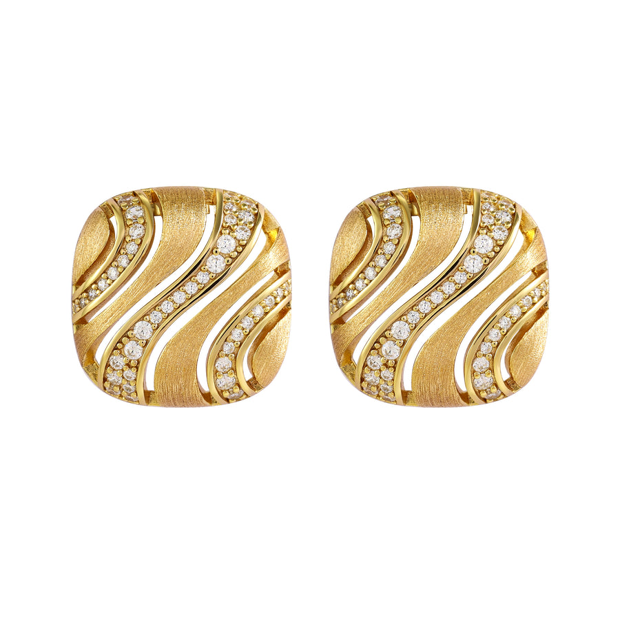Elevate your style with our cushion-shaped stud earrings, featuring an intricate hollow cut adorned with graceful wavy lines. Clusters of white melee diamonds add a touch of brilliance to the carefully engraved surface, creating a stunning and sophisticated accessory for any occasion.