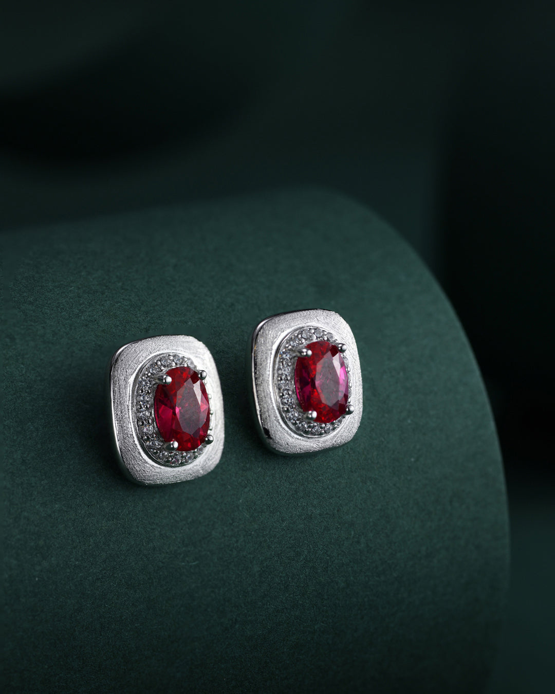 Oval Ruby Stud Earrings with Engraved Platinum Base