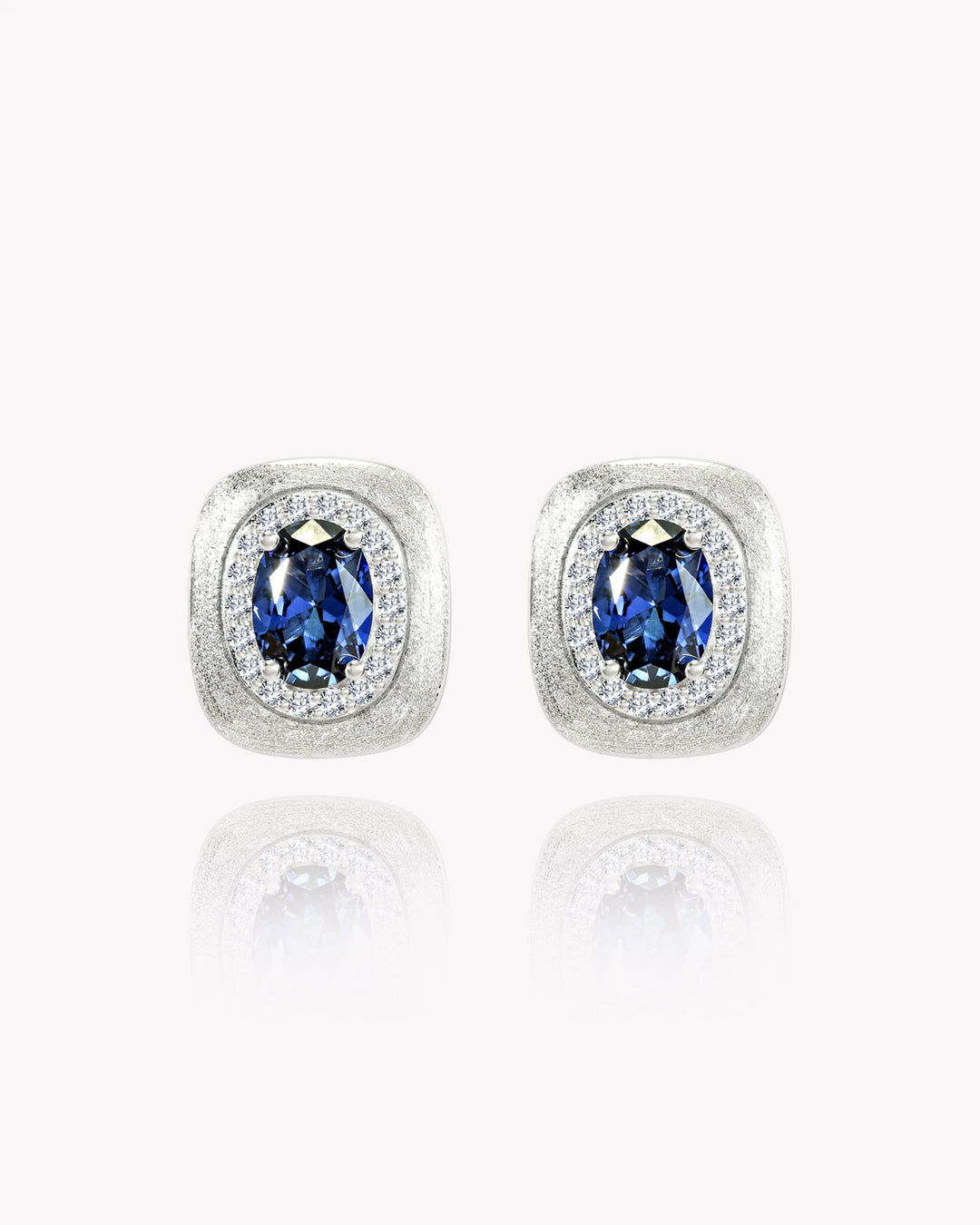 Oval Sapphire Stud Earrings with Engraved Platinum Base