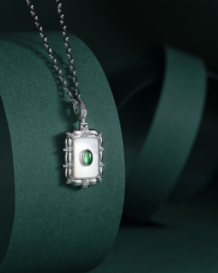 Emerald Pendant with Mother-of-Pearl in Platinum Frame