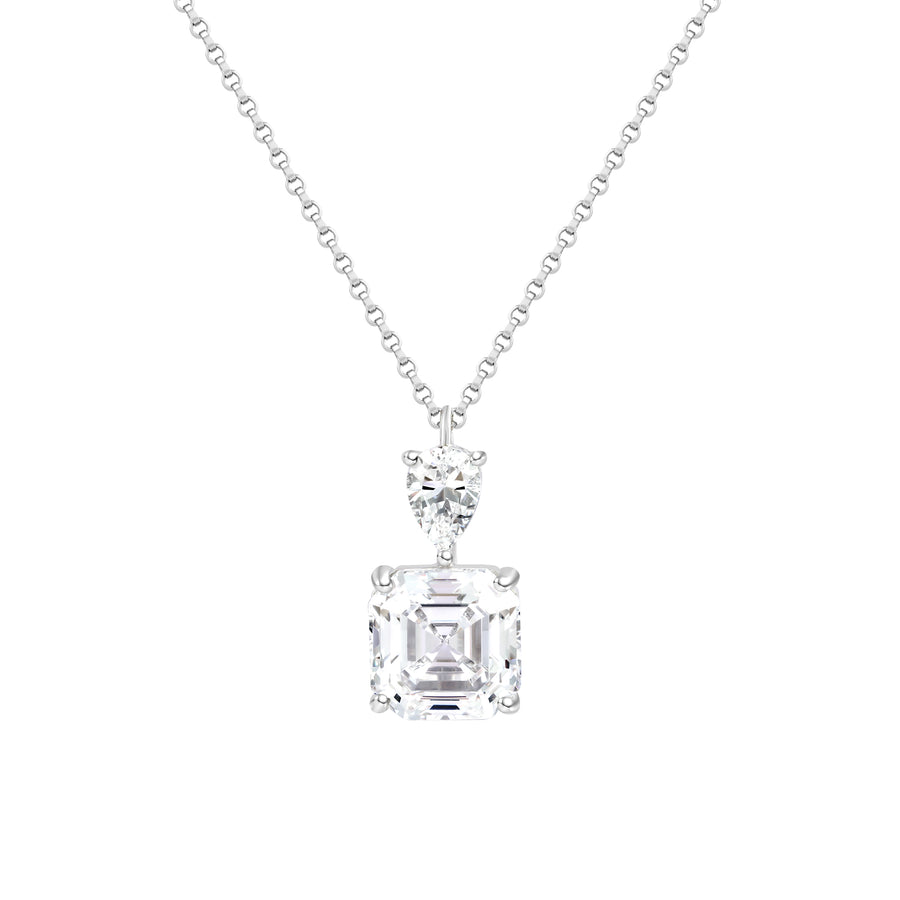 This pendant features two exquisite components - A prominent Asscher-cut white simulated diamond takes center stage, crowned by a smaller pear-shaped white diamond, creating a harmonious and elegant design.