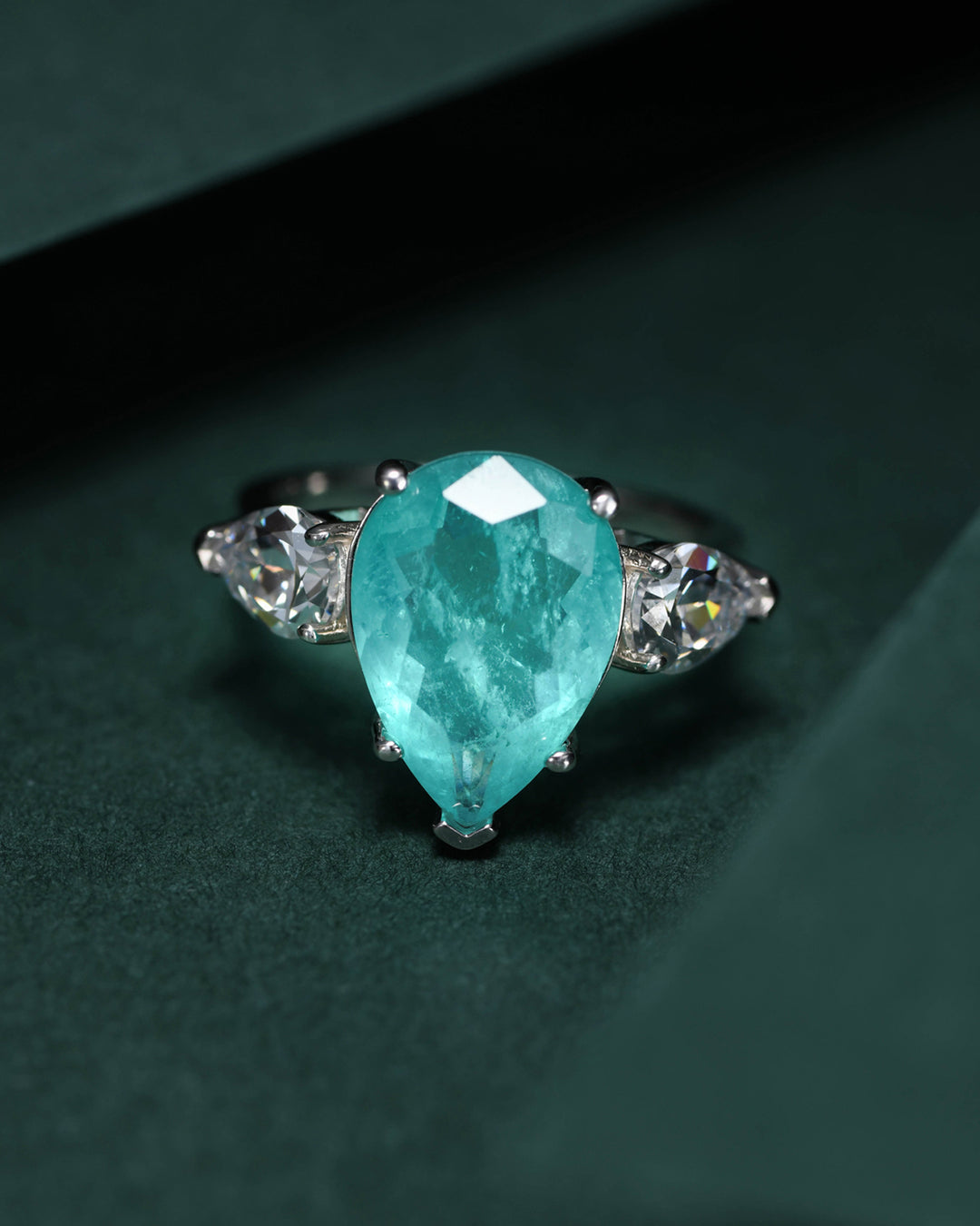 Tear of Joséphine: Pear Cut Blue-Green Diamond Ring with White Diamond Accents