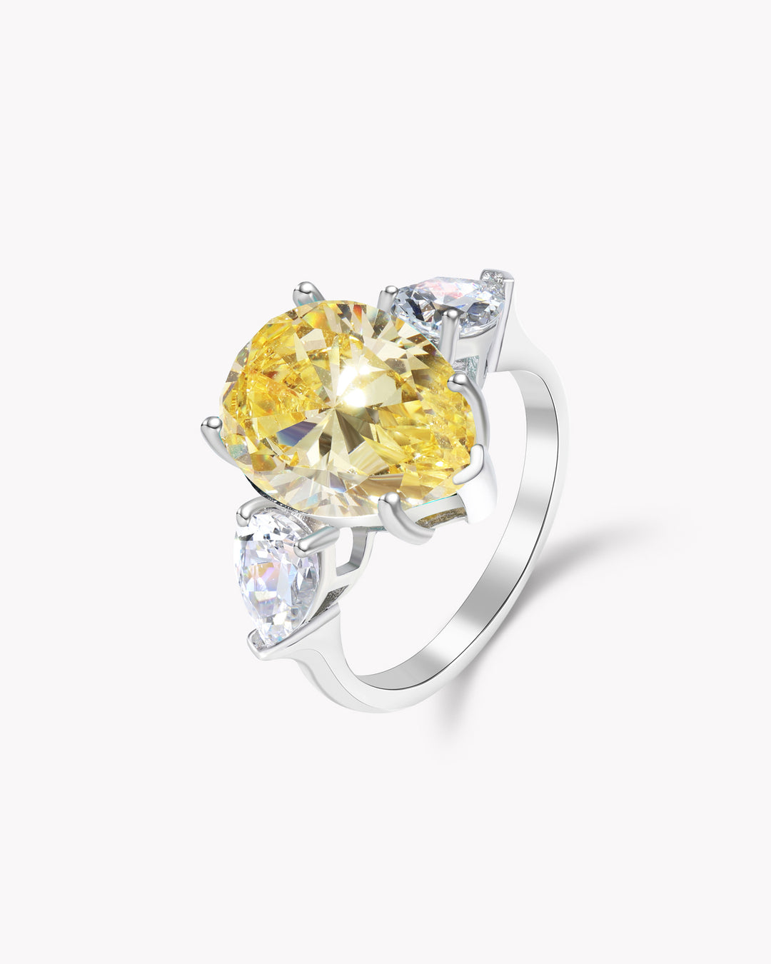 Tear of Joséphine: Pear Cut Yellow Diamond Ring with White Diamond Accents