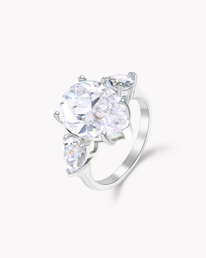 Tear of Joséphine: Pear Cut White Diamond Ring with White Diamond Accents