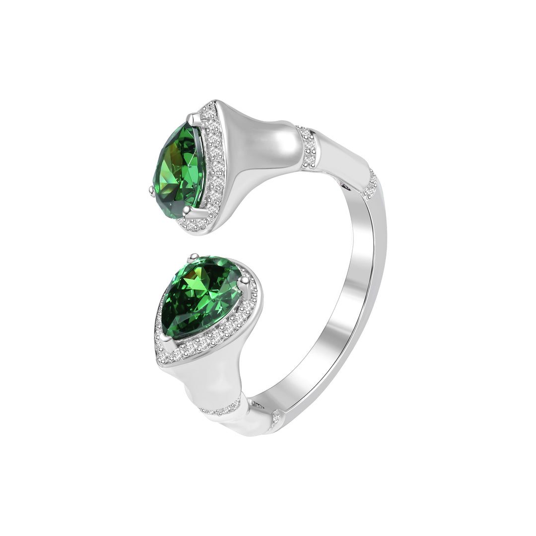 Unveil the charm of our front-open ring adorned with two pear-cut emeralds, where the ring band beautifully mimics the graceful contours of bamboo joints. This unique design seamlessly combines natural elegance with sophistication.